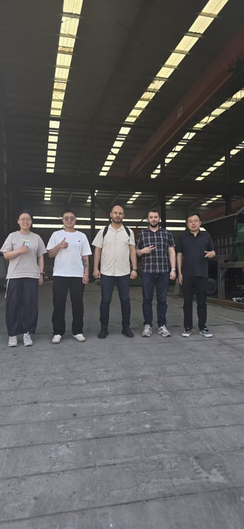 Pioneer Group and a client on the factory floor in Yiwu