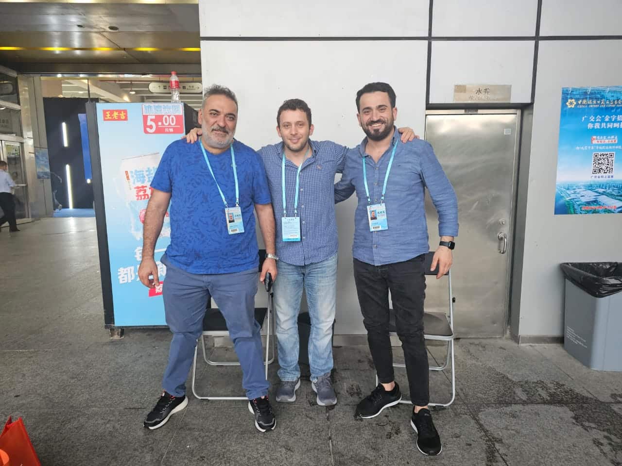 Pioneer Group team with a client at a trade fair in China