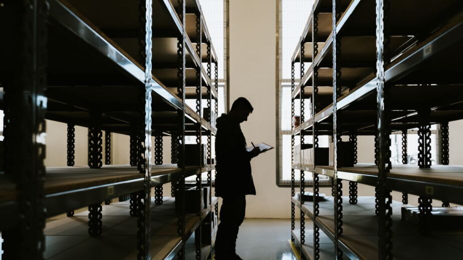 Warehouse inspection with a clipboard, a key check when asking is it safe to buy from China