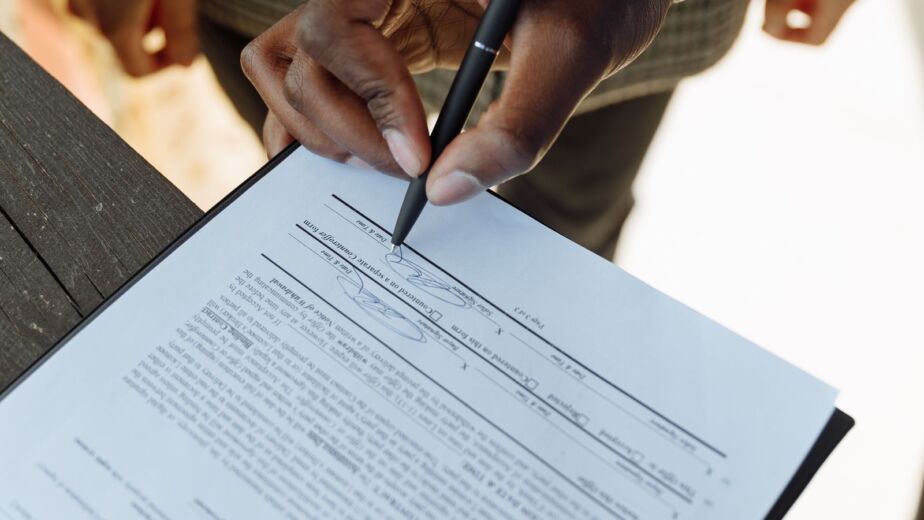 Signing supplier documents, part of how to verify a Chinese supplier before paying